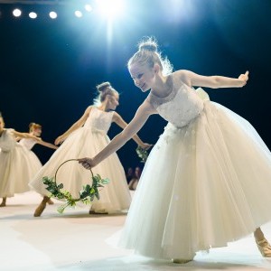 Press Page - Image of children dancing on the Catwalk