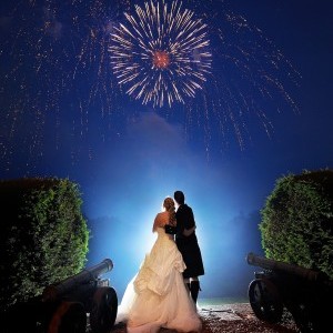 couple looking up at fireworks
